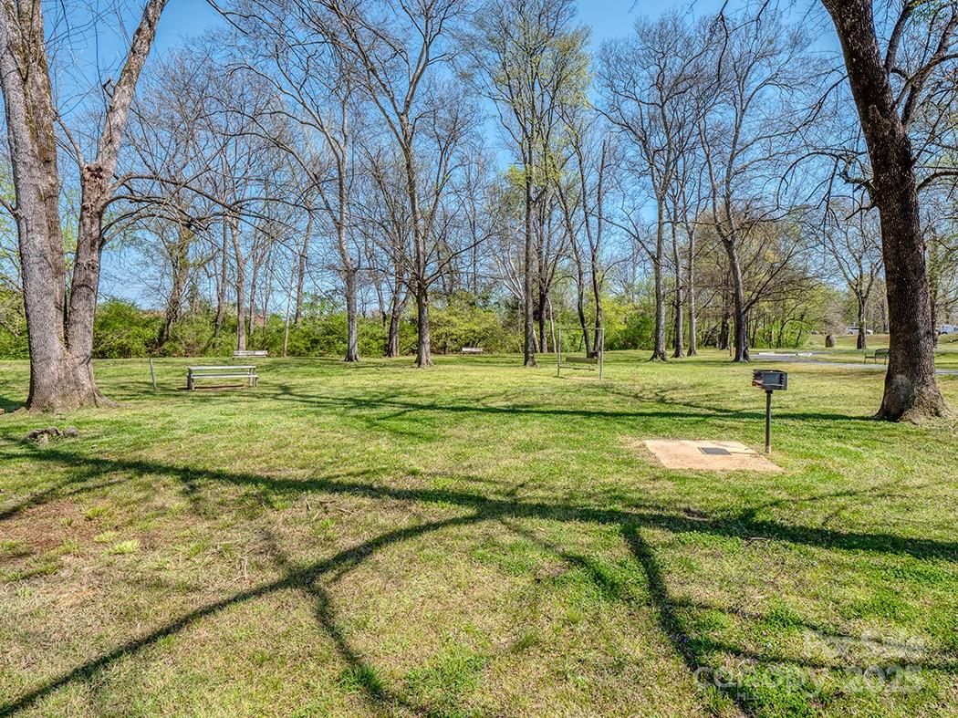 319 Connor Street Lancaster, SC 29720 - Photo 40 of 47 a view of a park with large trees
