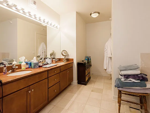 a room with a sink and cabinets