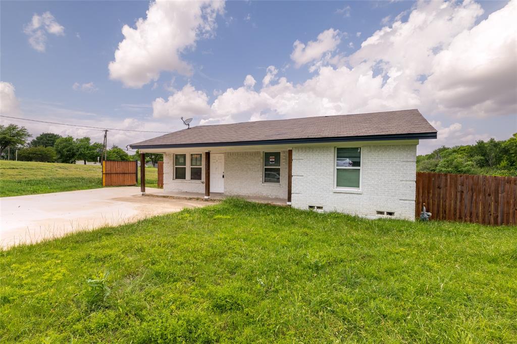 805 East Belt Line Road DeSoto, TX 75115 - Photo 2 of 15 a house view with a garden space