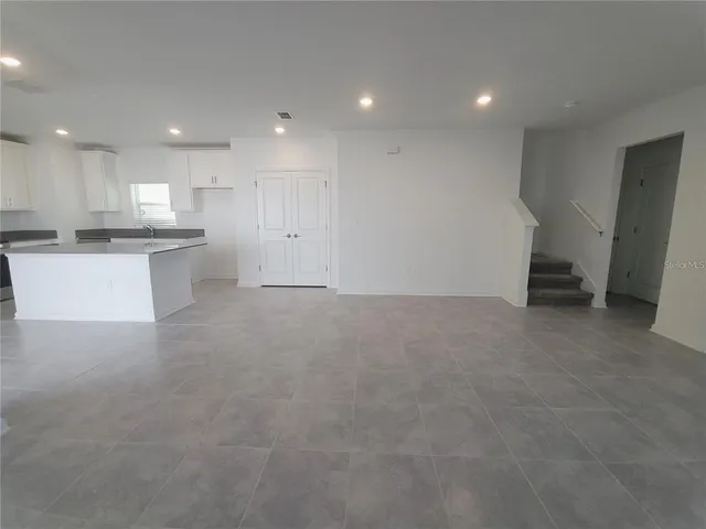 a view of entryway with stairs