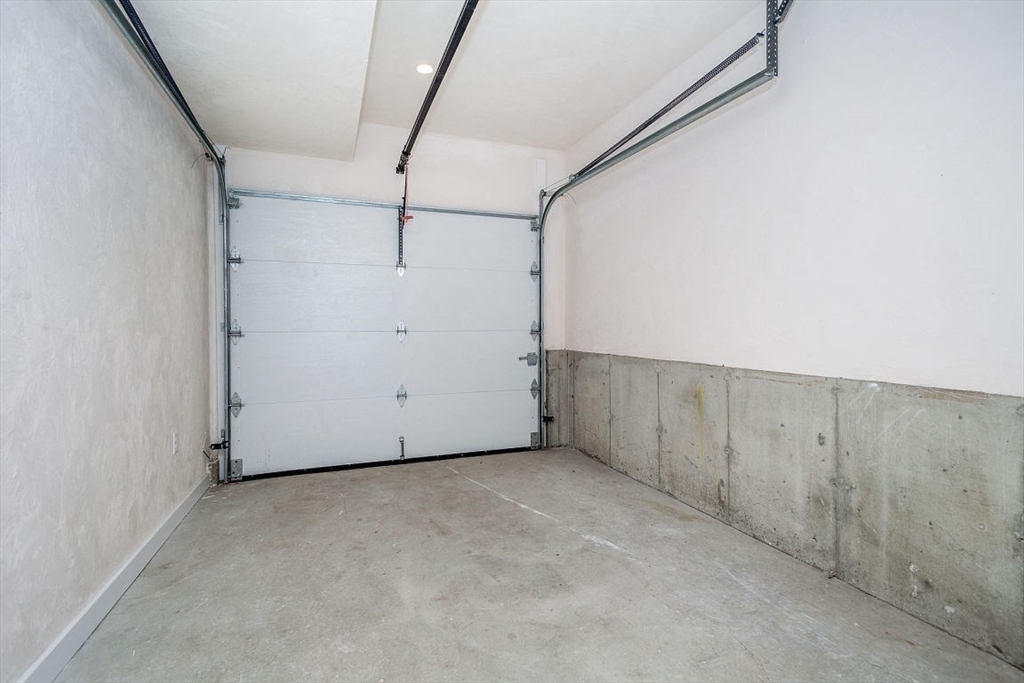 53 River Street, Unit 53 Boston, MA 02126 - Photo 16 of 25 a view of a garage