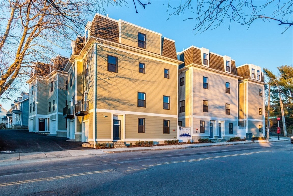 53 River Street, Unit 53 Boston, MA 02126 - Photo 18 of 25 a view of a building with a street