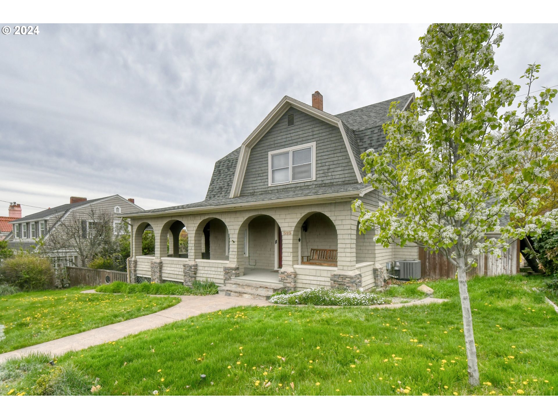 323 North Main Street Pendleton, OR 97801 - Photo 1 of 48 a front view of house with yard and green space