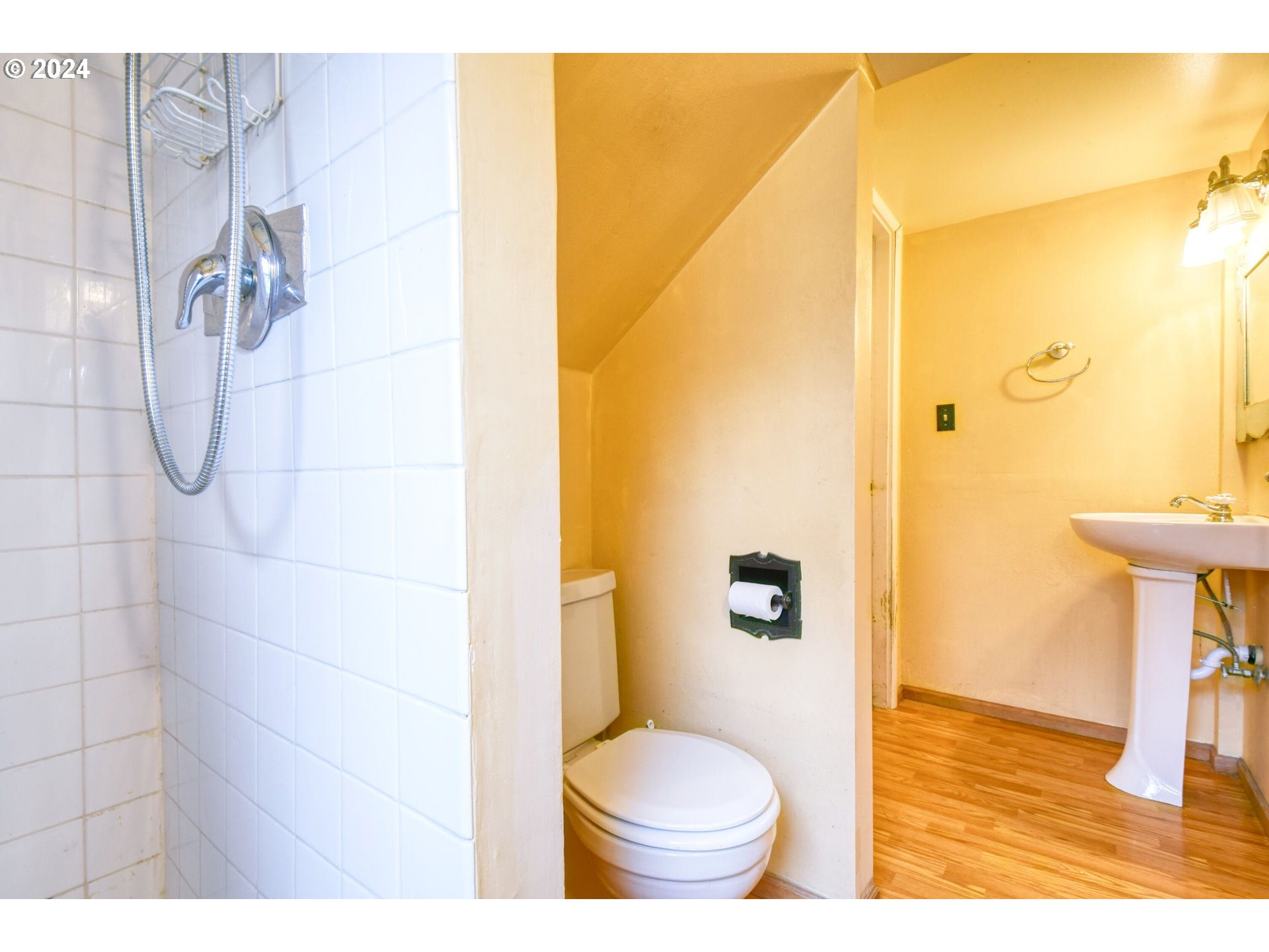 323 North Main Street Pendleton, OR 97801 - Photo 35 of 48 a bathroom with a toilet and a shower