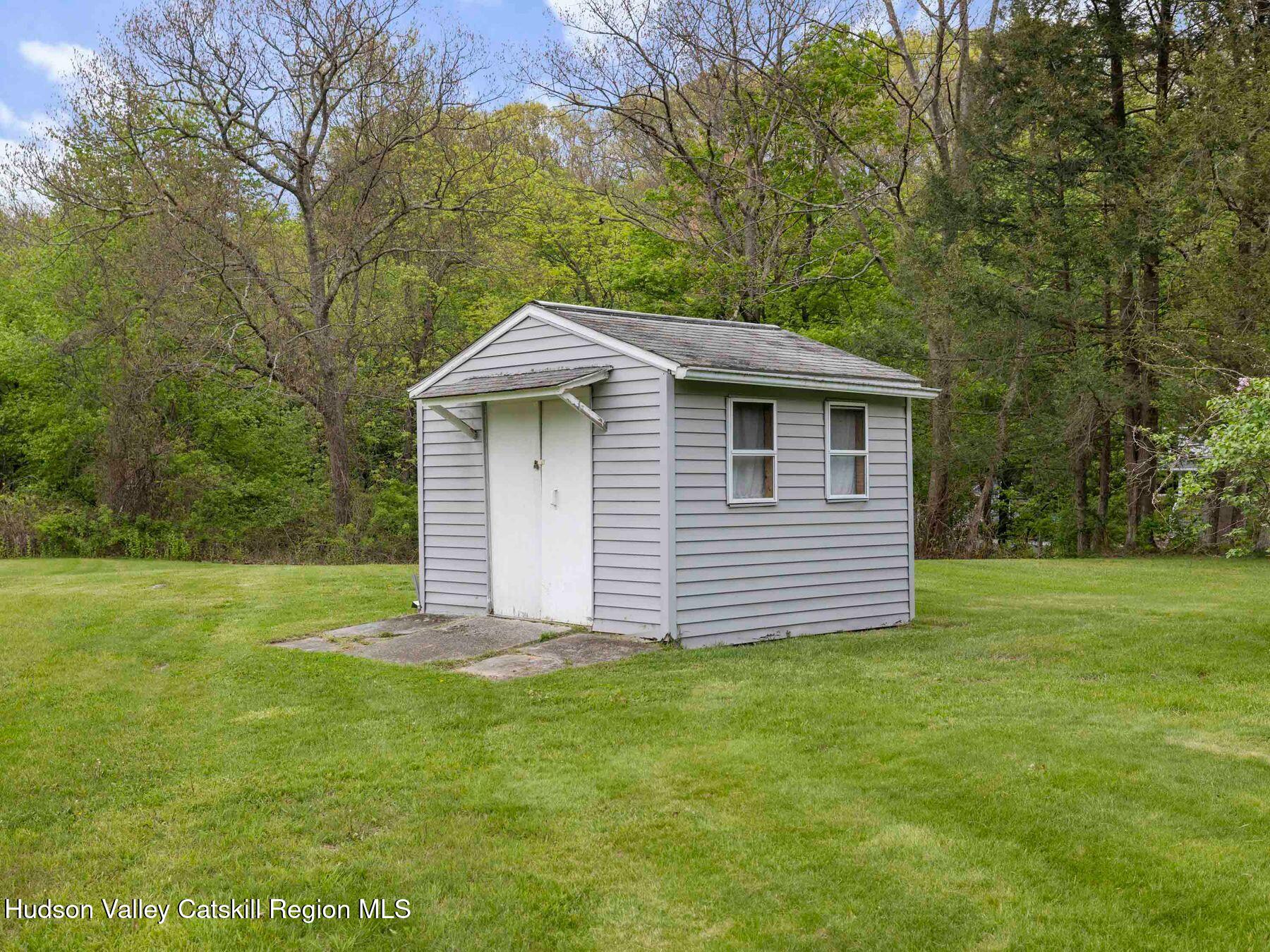 104 New Paltz Road Highland, NY 12528 - Photo 41 of 43 a front view of a house with garden