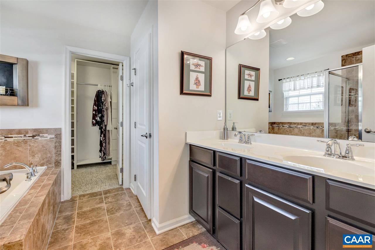 365 Ridgemont Road Ruckersville, VA 22968 - Photo 24 of 50 a spacious bathroom with a double vanity sink a mirror and a shower