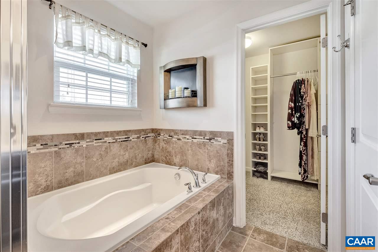 365 Ridgemont Road Ruckersville, VA 22968 - Photo 26 of 50 a bathroom with a bathtub and a shower