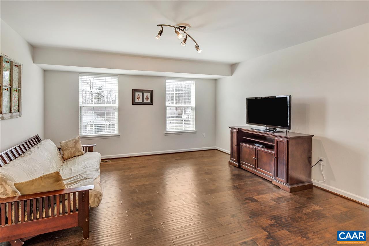 365 Ridgemont Road Ruckersville, VA 22968 - Photo 29 of 50 a living room with furniture and a flat screen tv