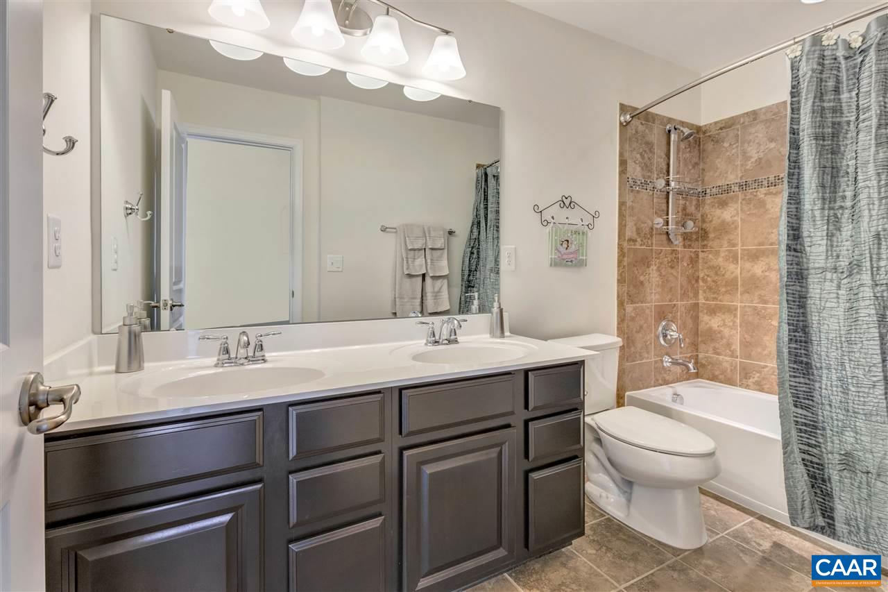 365 Ridgemont Road Ruckersville, VA 22968 - Photo 35 of 50 a bathroom with a double vanity sink mirror and toilet