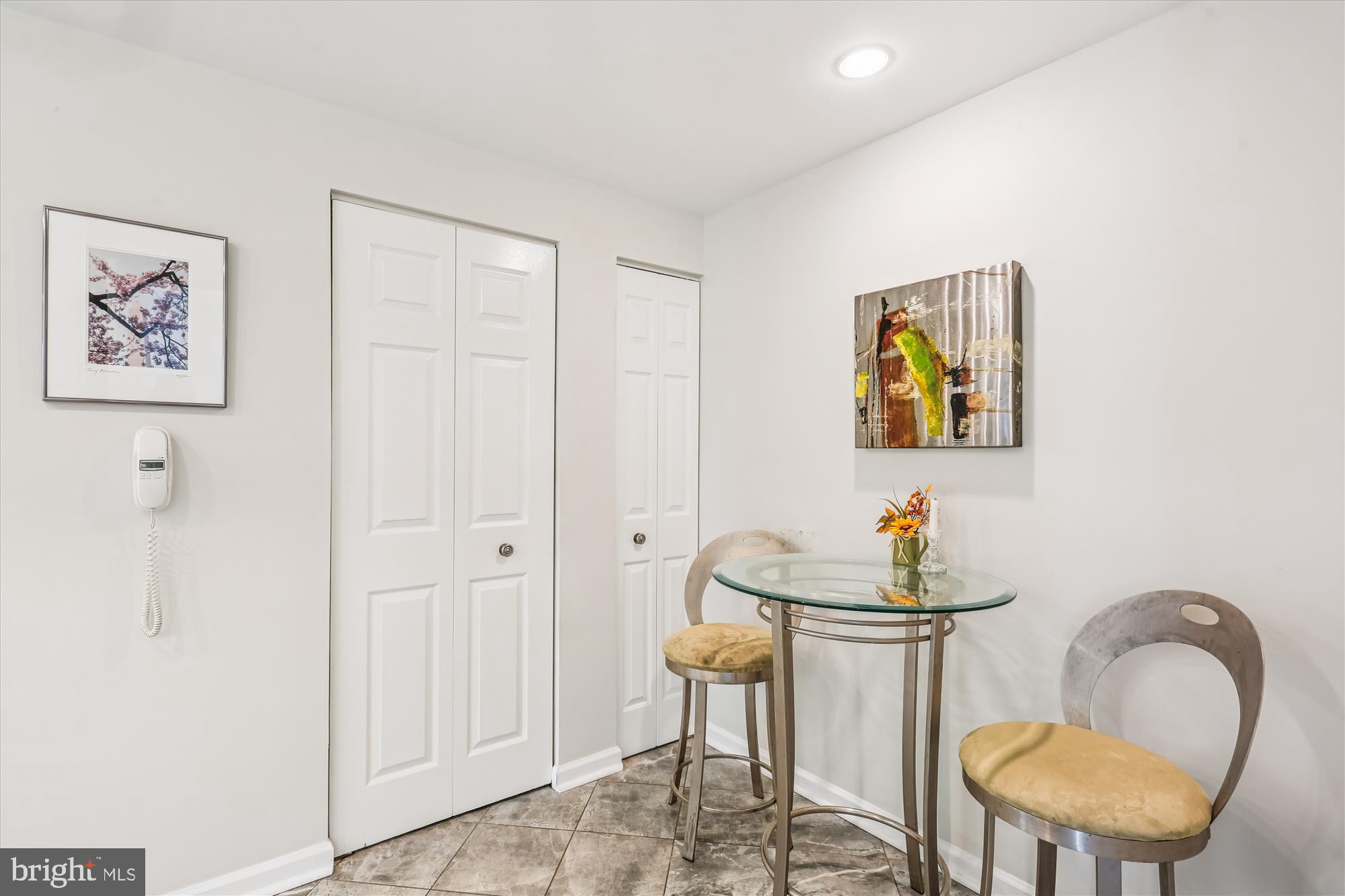 5600 Wisconsin Avenue, Unit 1105 Chevy Chase, MD 20815 - Photo 15 of 67 a living room with furniture and window