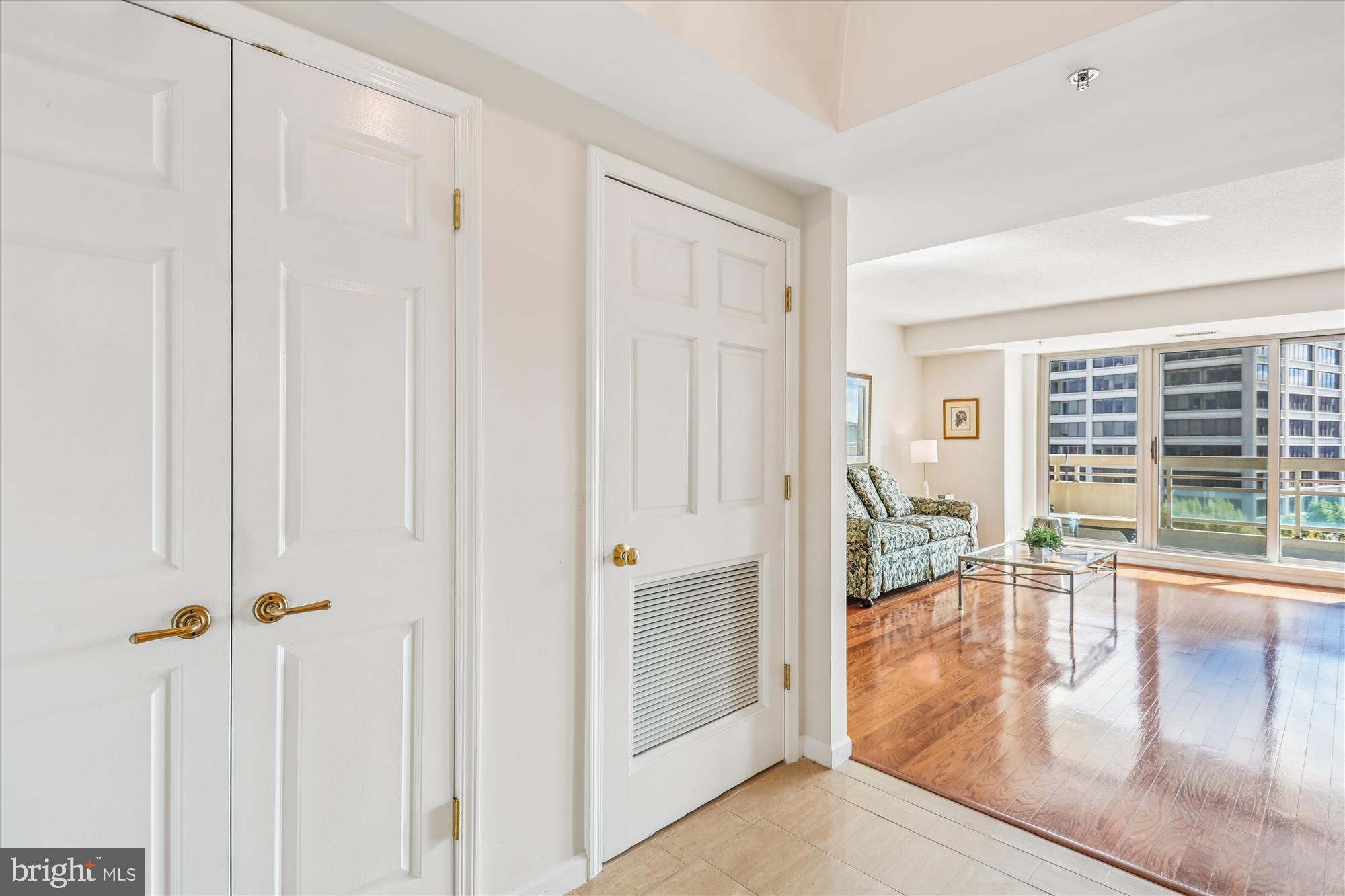 5600 Wisconsin Avenue, Unit 1105 Chevy Chase, MD 20815 - Photo 2 of 67 Foyer entry with coat closet & marble flooring