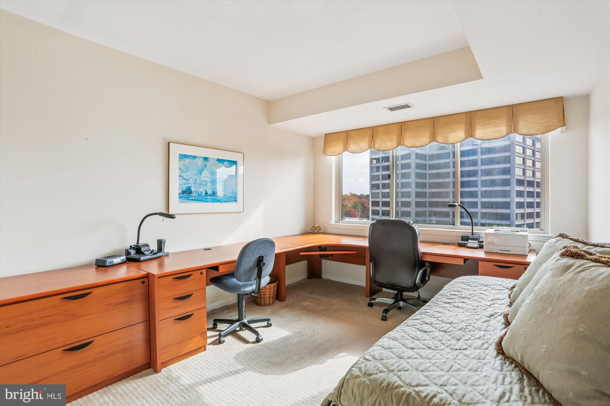 5600 Wisconsin Avenue, Unit 1105 Chevy Chase, MD 20815 - Photo 25 of 67 a view of a workspace with furniture and a window