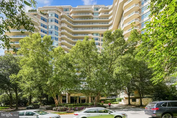 a living room with a rug