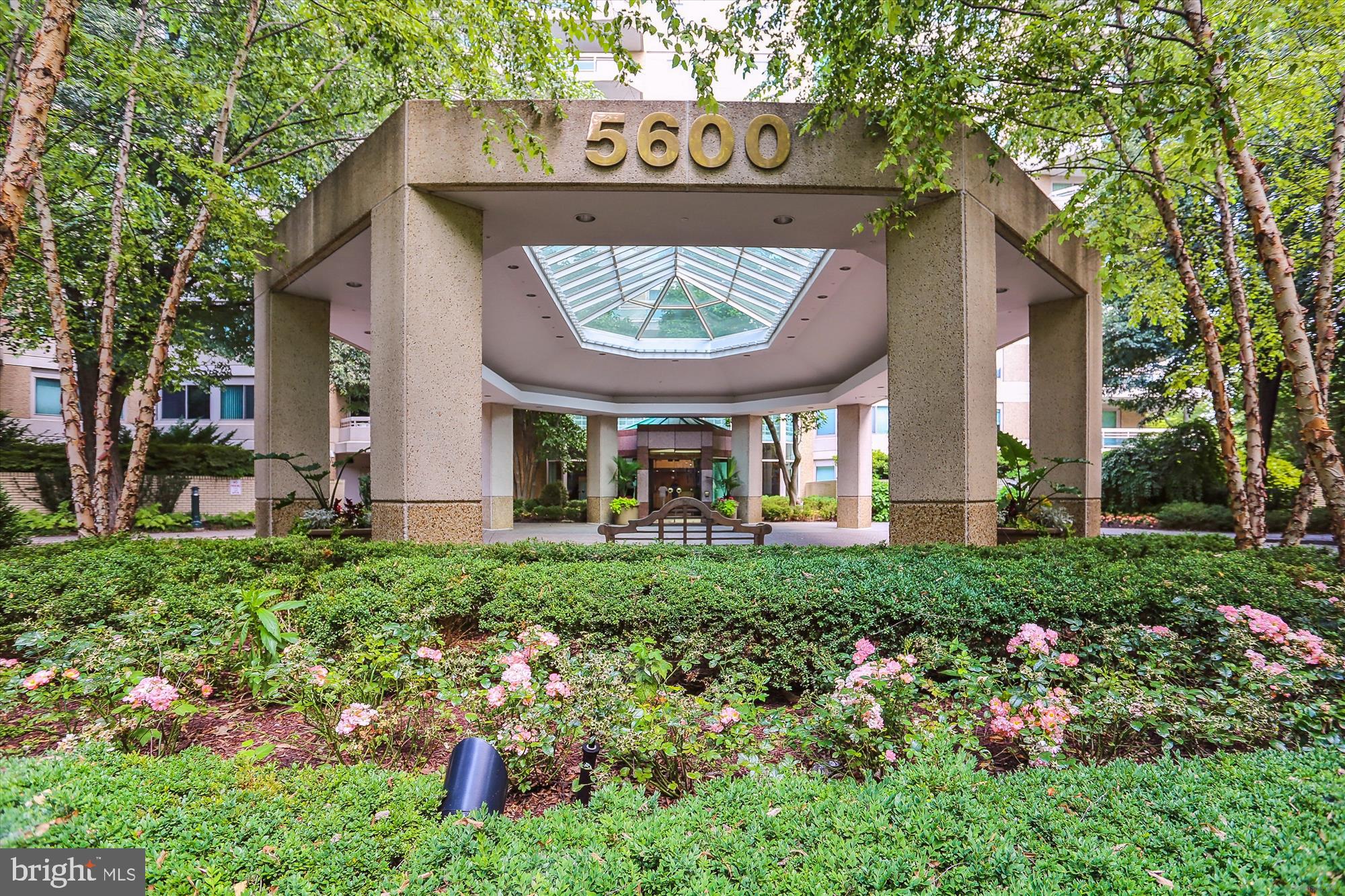 5600 Wisconsin Avenue, Unit 1105 Chevy Chase, MD 20815 - Photo 47 of 67 a front view of a house with garden