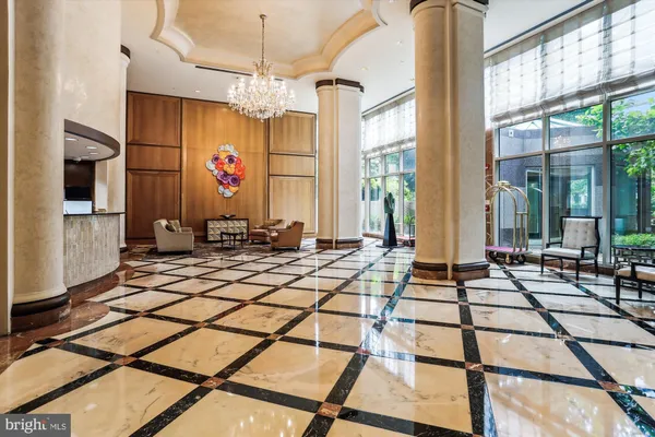 a view of a backyard with sitting area