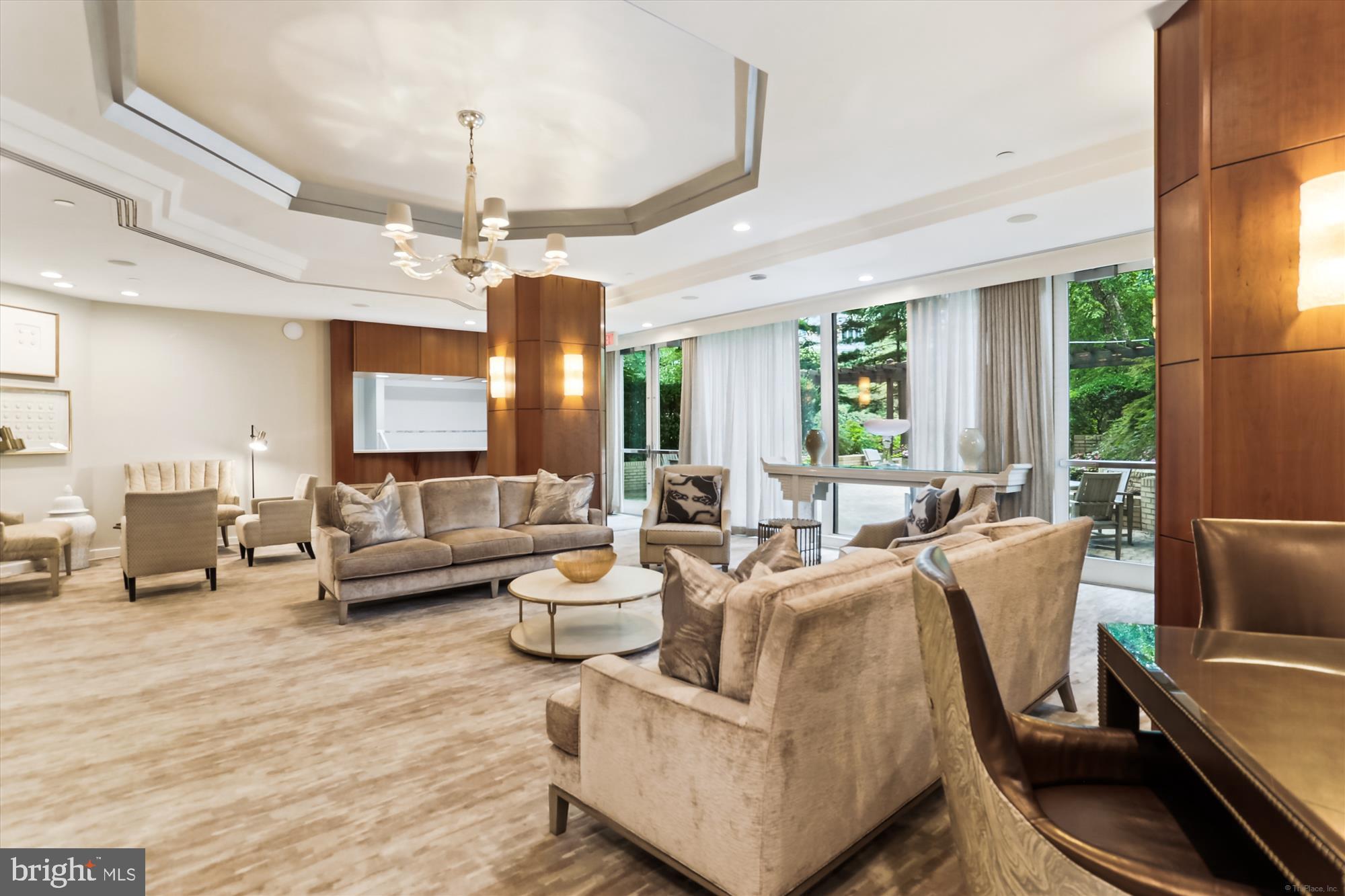 5600 Wisconsin Avenue, Unit 1105 Chevy Chase, MD 20815 - Photo 53 of 67 a living room with furniture wooden floor and a chandelier