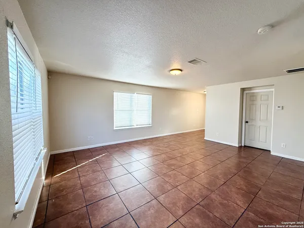 an empty room with windows