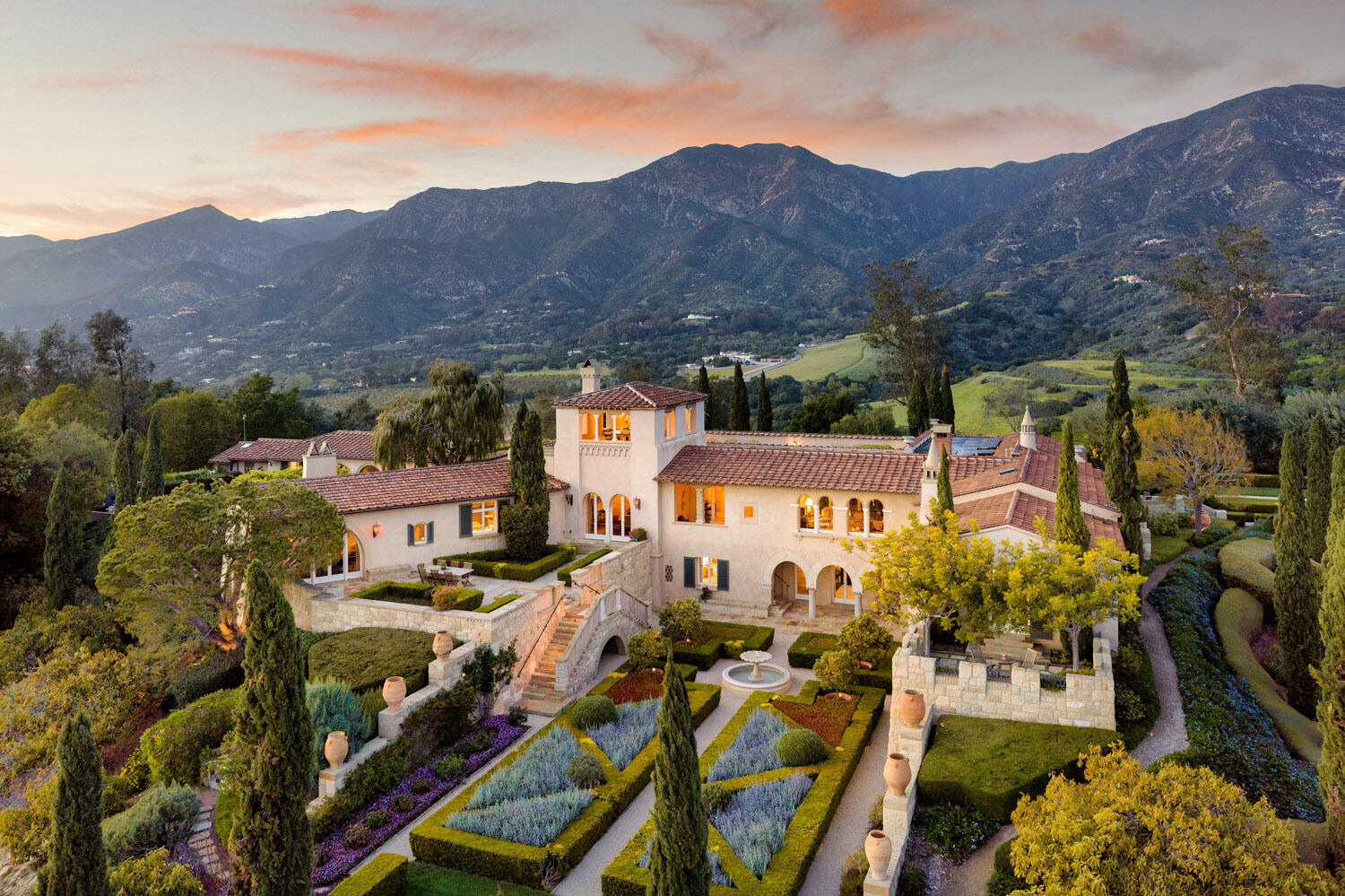 an aerial view of residential houses and outdoor space