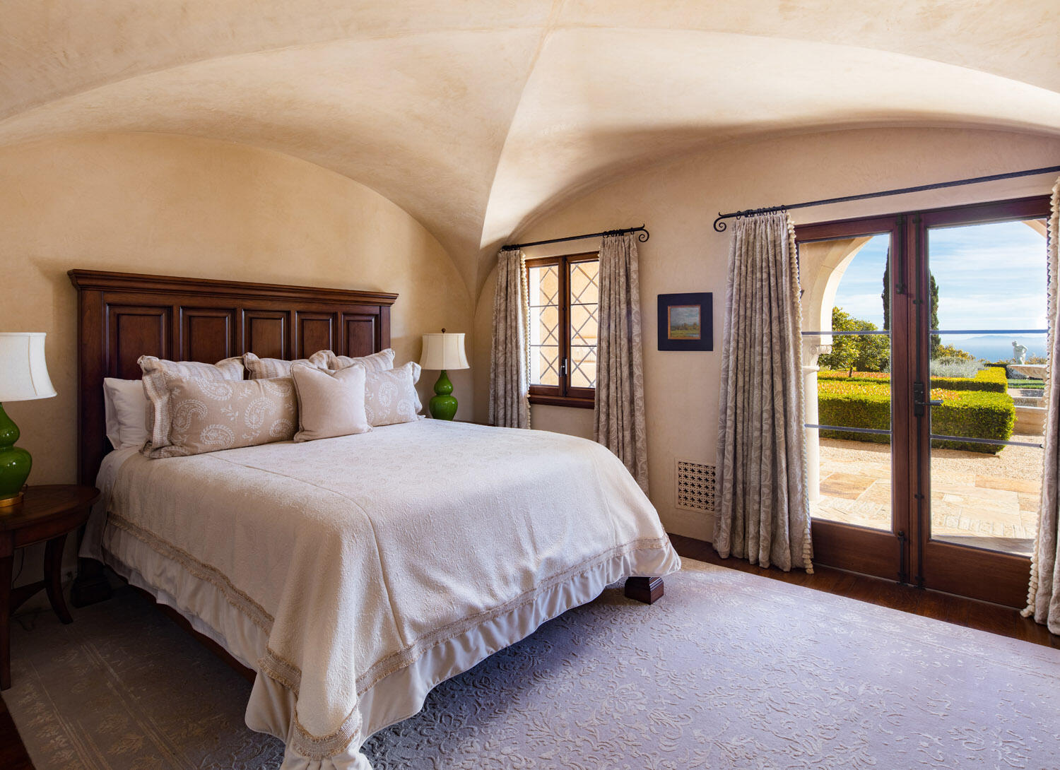 550 Freehaven Drive Montecito, CA 93108 - Photo 24 of 38 a spacious bedroom with a bed and glass door