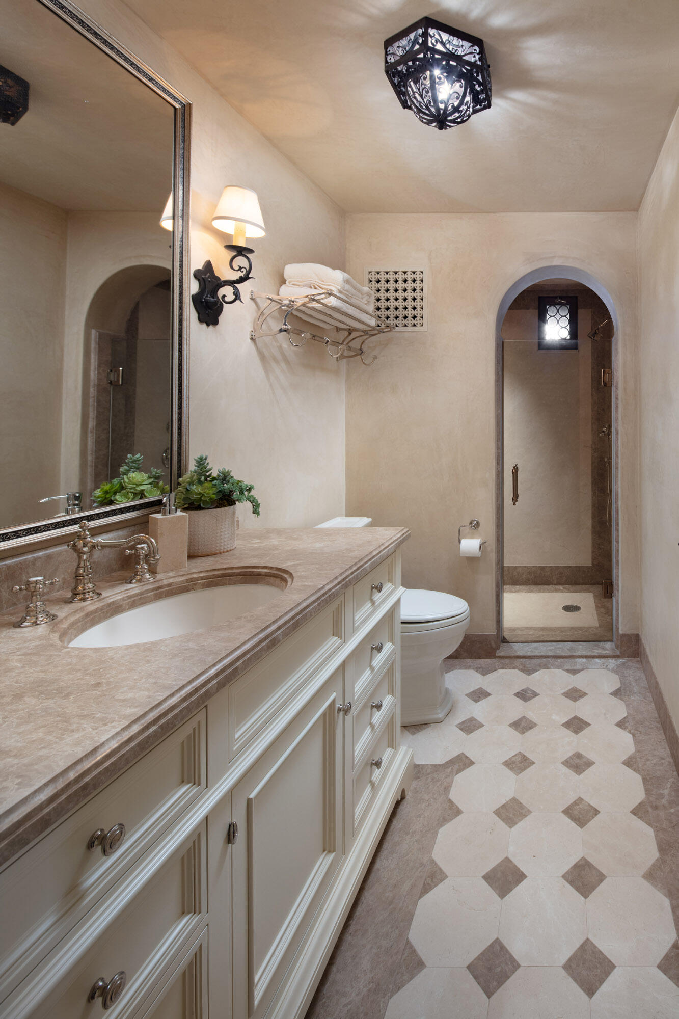 550 Freehaven Drive Montecito, CA 93108 - Photo 25 of 38 a bathroom with a sink a toilet and mirror