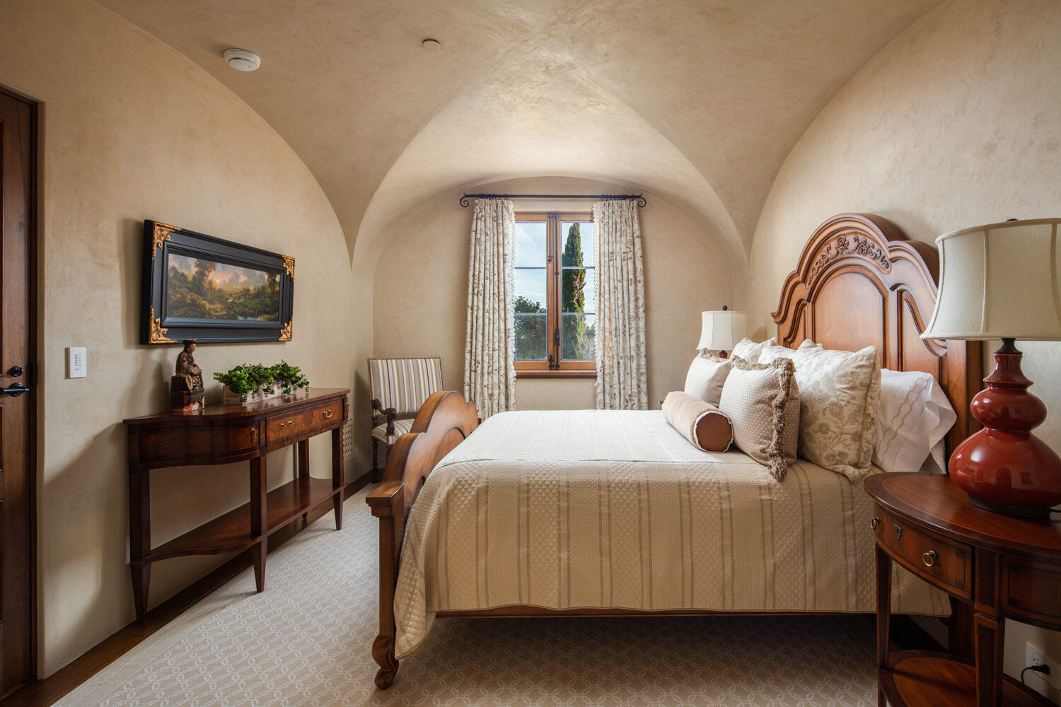 550 Freehaven Drive Montecito, CA 93108 - Photo 26 of 38 a bedroom with a bed and a chandelier