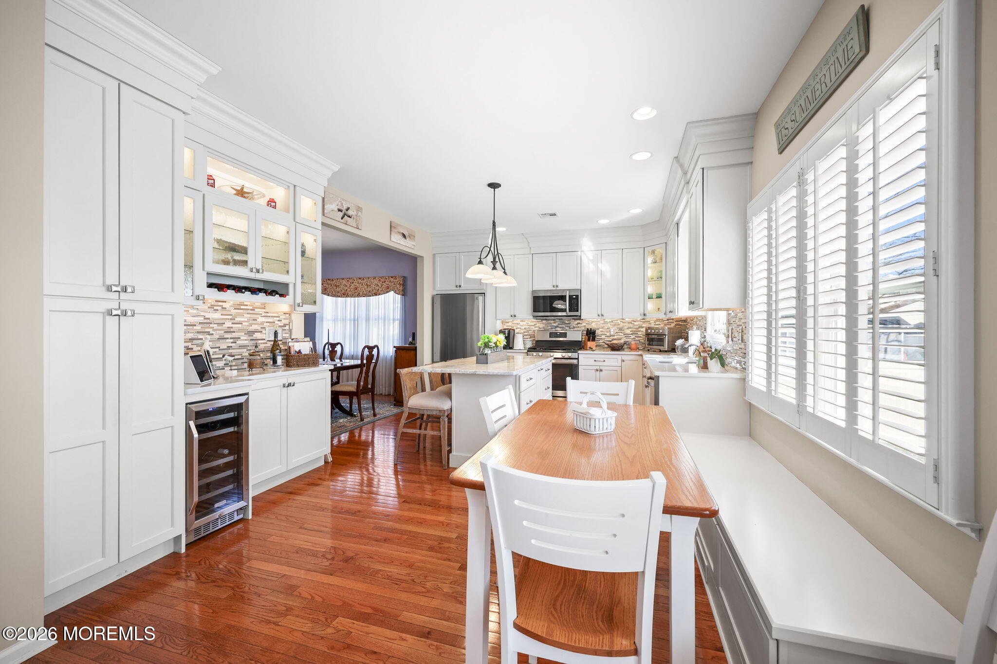 1726 M Street Wall, NJ 07719 - Photo 11 of 49 a large kitchen with kitchen island a large window cabinets and stainless steel appliances