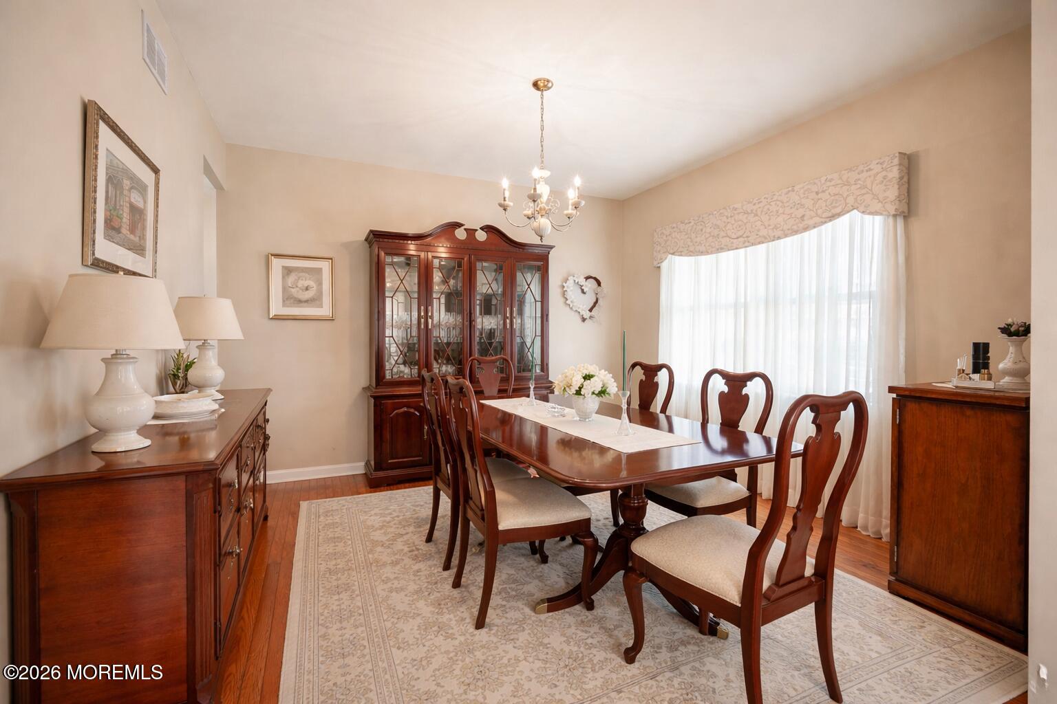 1726 M Street Wall, NJ 07719 - Photo 18 of 49 a dining room with furniture and window