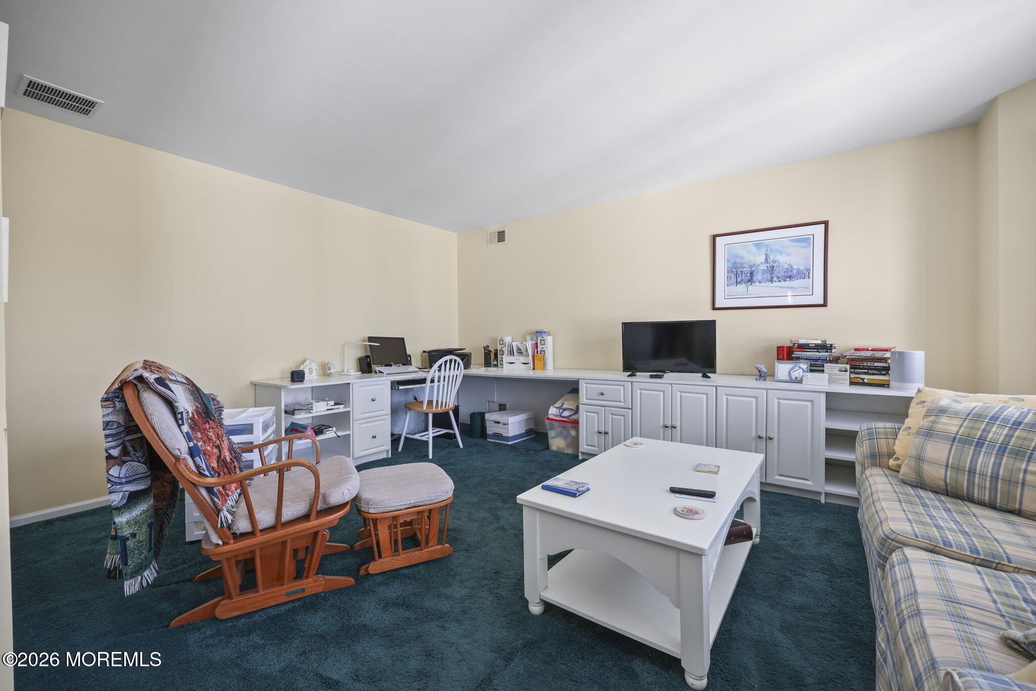 1726 M Street Wall, NJ 07719 - Photo 24 of 49 a living room with furniture and a flat screen tv