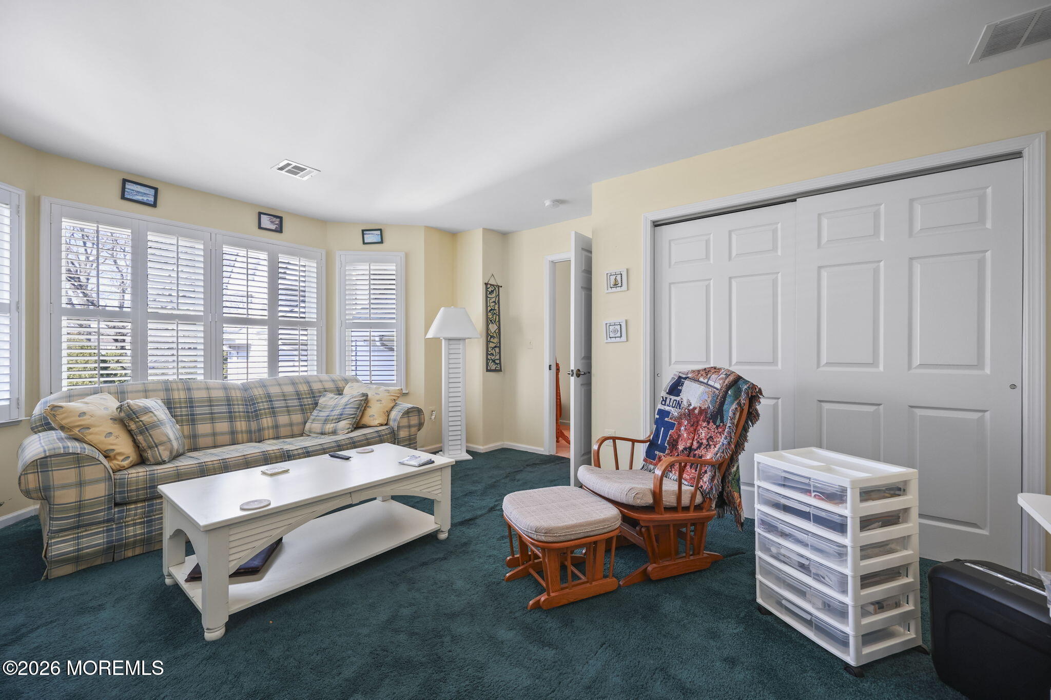 1726 M Street Wall, NJ 07719 - Photo 25 of 49 a living room with furniture and a window