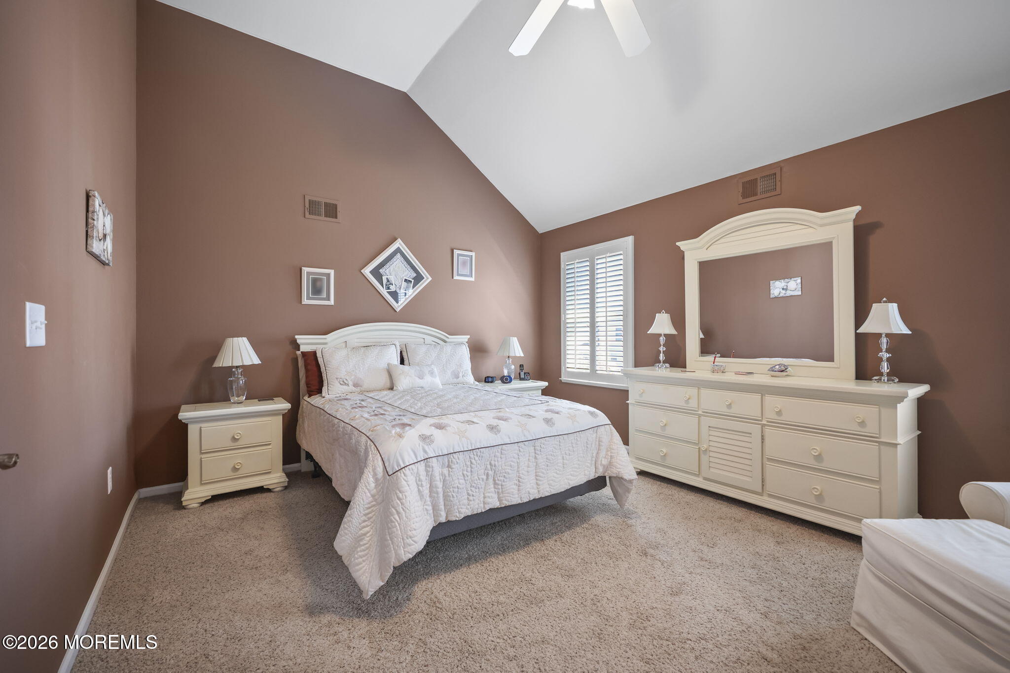 1726 M Street Wall, NJ 07719 - Photo 27 of 49 a bedroom with a bed and a dresser
