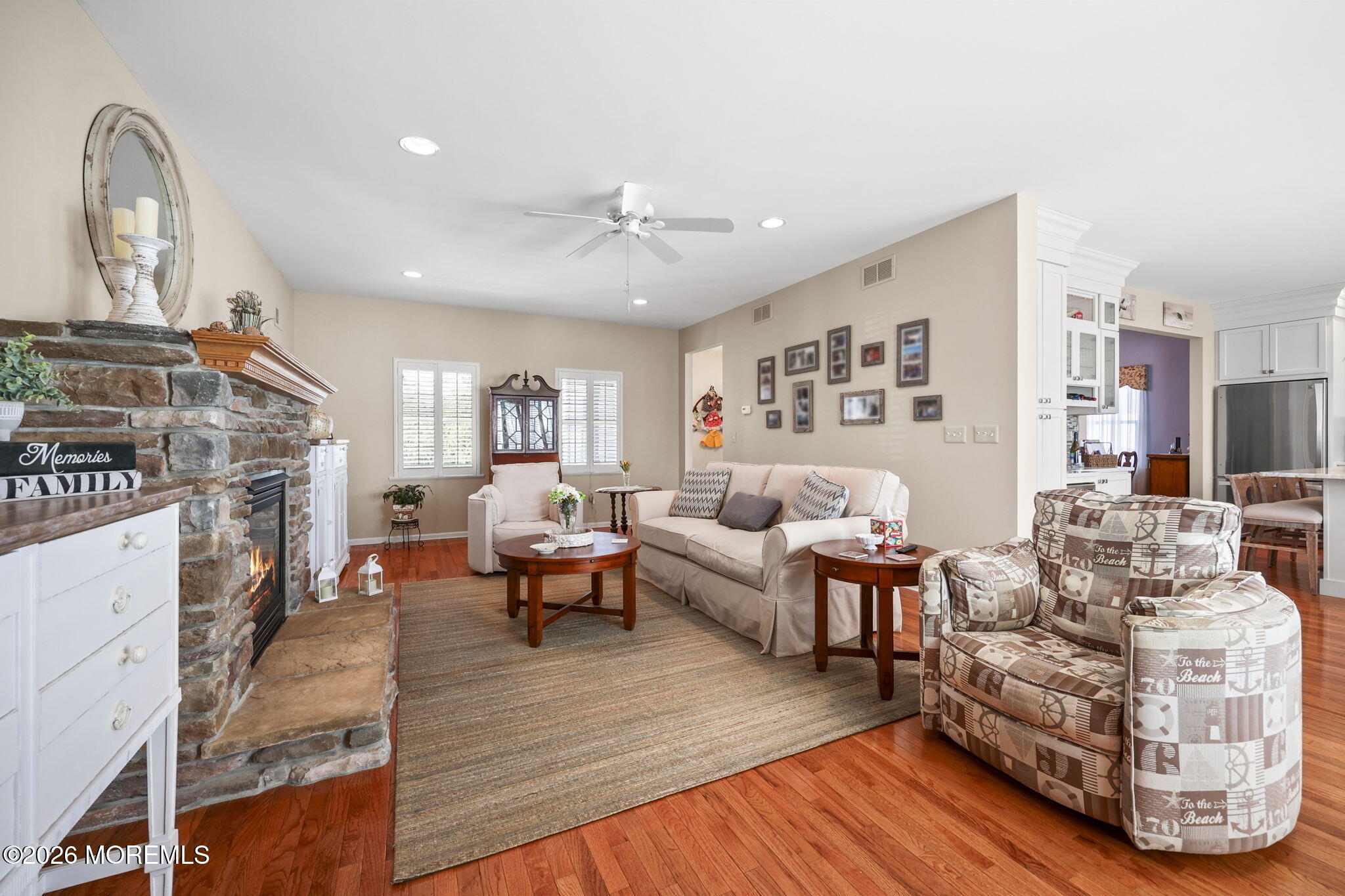 1726 M Street Wall, NJ 07719 - Photo 10 of 49 a living room with fireplace furniture and a wooden floor