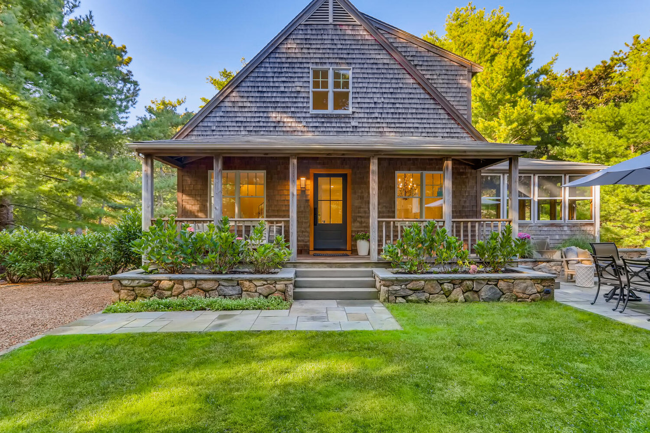 4 Penny Lane Edgartown, MA 02539 - Photo 1 of 60 a front view of a house with a yard