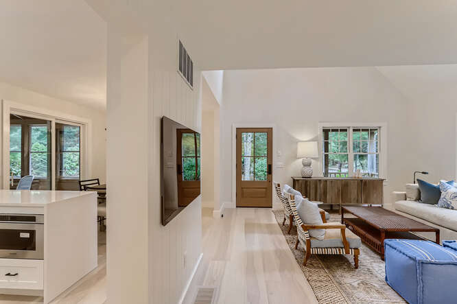 4 Penny Lane Edgartown, MA 02539 - Photo 20 of 60 a living room with furniture and a window