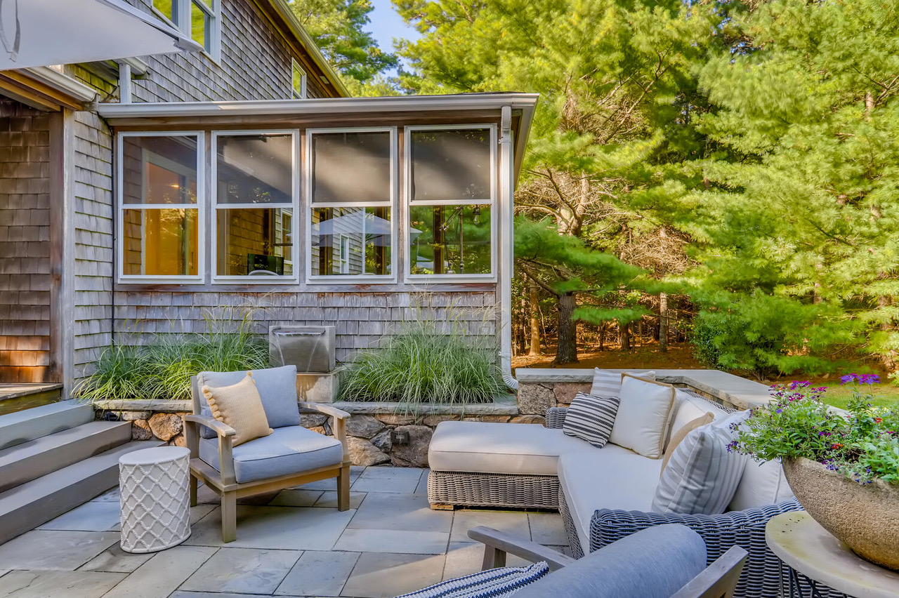 4 Penny Lane Edgartown, MA 02539 - Photo 3 of 60 a view of a patio with couches and potted plants