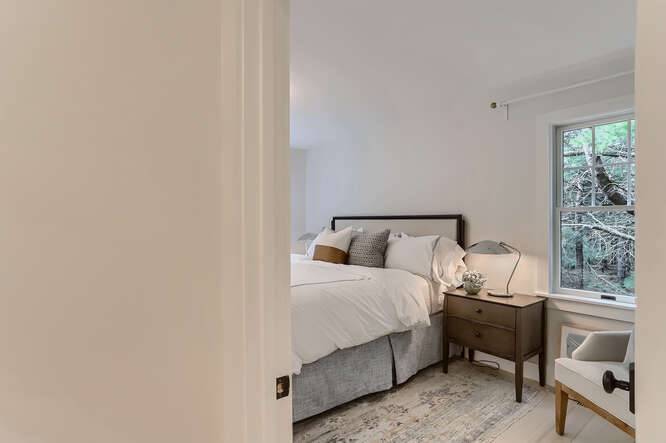 4 Penny Lane Edgartown, MA 02539 - Photo 24 of 60 a bedroom with a bed and a window