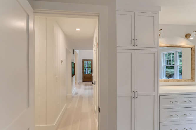4 Penny Lane Edgartown, MA 02539 - Photo 28 of 60 a view of a hallway with closet and wooden floor