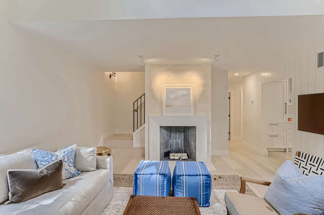 4 Penny Lane Edgartown, MA 02539 - Photo 30 of 60 a living room with furniture and a fireplace