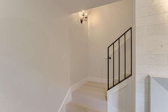 4 Penny Lane Edgartown, MA 02539 - Photo 31 of 60 a view of a hallway with staircase