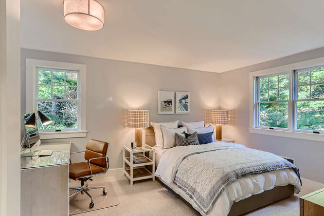 4 Penny Lane Edgartown, MA 02539 - Photo 33 of 60 a bedroom with a bed and a large window