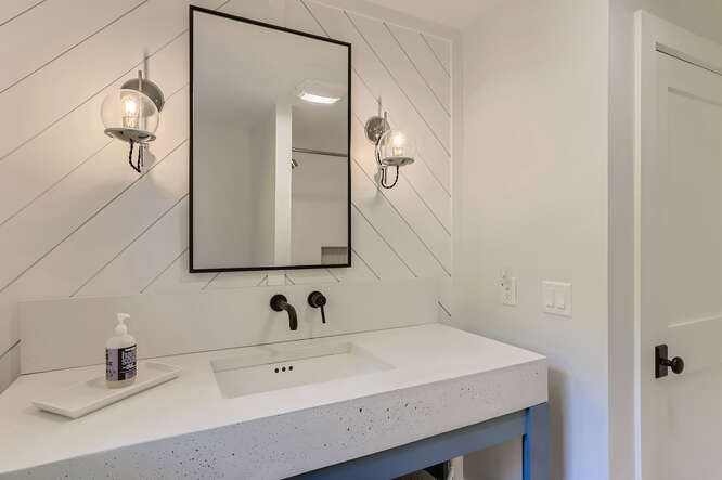 4 Penny Lane Edgartown, MA 02539 - Photo 40 of 60 a bathroom with a sink and a mirror