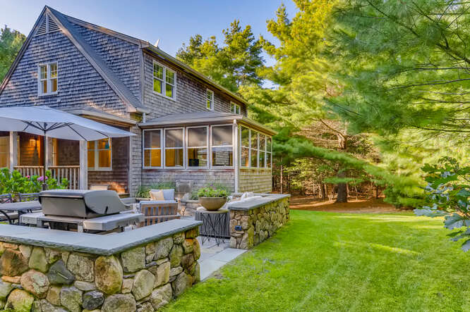 4 Penny Lane Edgartown, MA 02539 - Photo 51 of 60 a front view of house with yard and outdoor seating