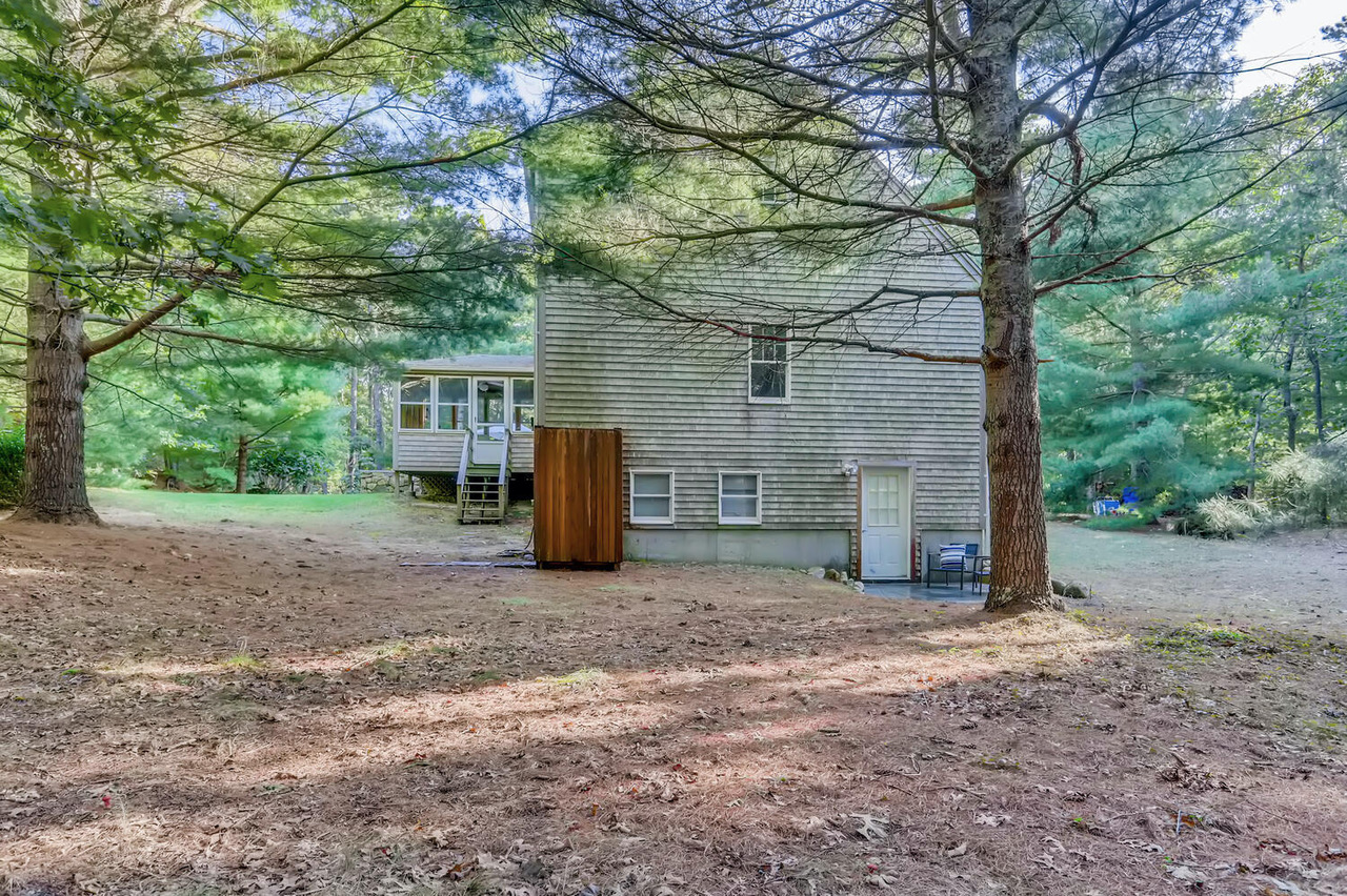 4 Penny Lane Edgartown, MA 02539 - Photo 55 of 60 a view of a house with a tree back yard