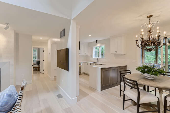 4 Penny Lane Edgartown, MA 02539 - Photo 9 of 60 a kitchen with a table and chairs in it