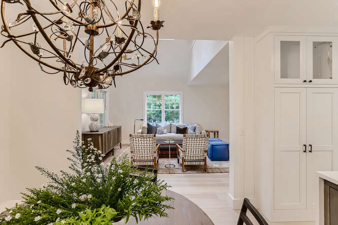 4 Penny Lane Edgartown, MA 02539 - Photo 10 of 60 a living room with furniture a chandelier and a window
