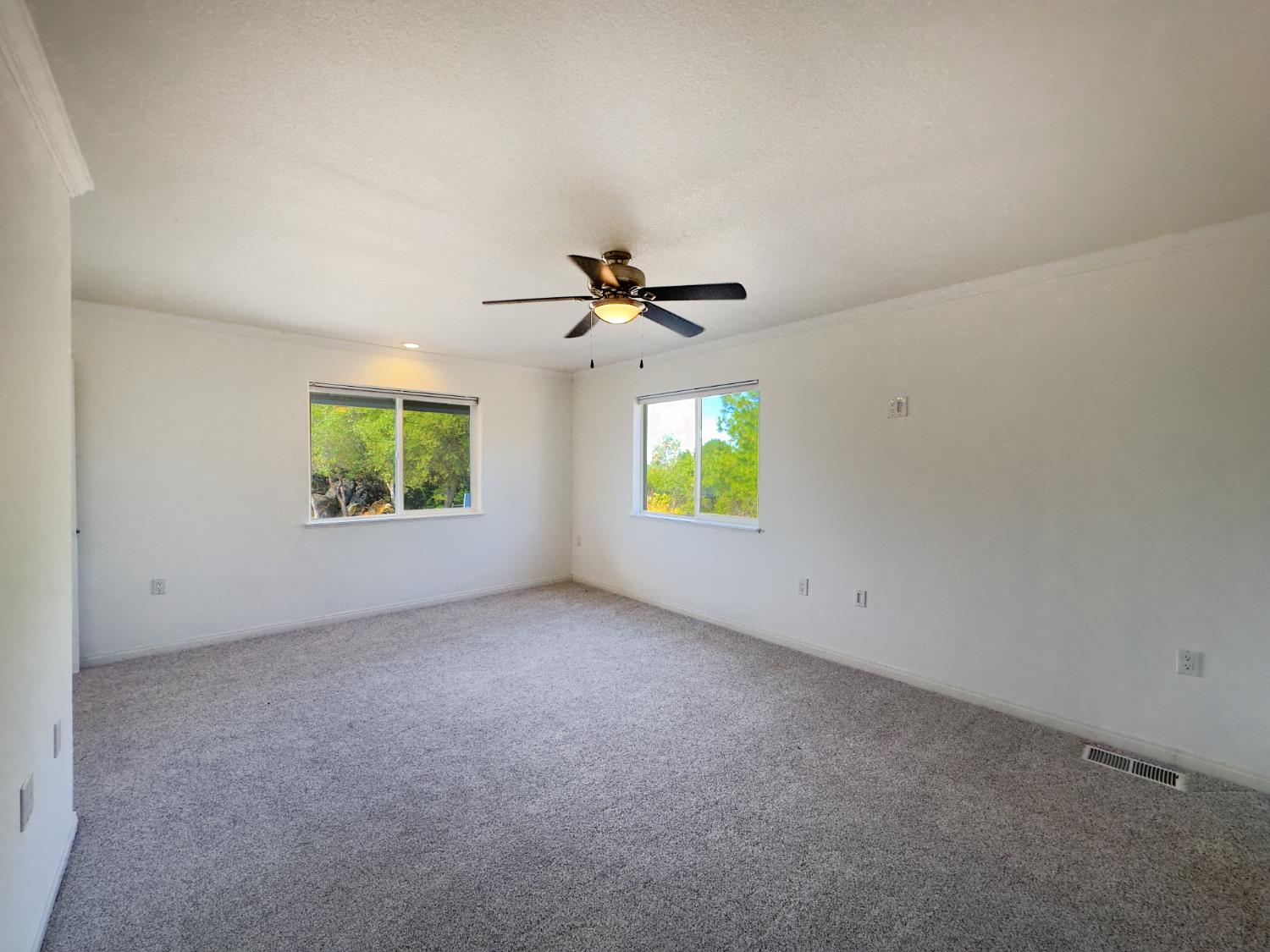 123 No Address Drive Rough and Ready, CA 95975 - Photo 15 of 95 an empty room with window and a ceiling fan