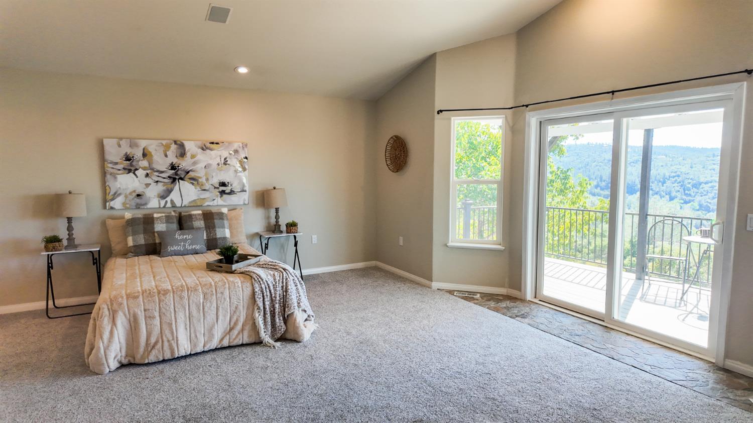 123 No Address Drive Rough and Ready, CA 95975 - Photo 39 of 95 a bedroom with a bed and a large window