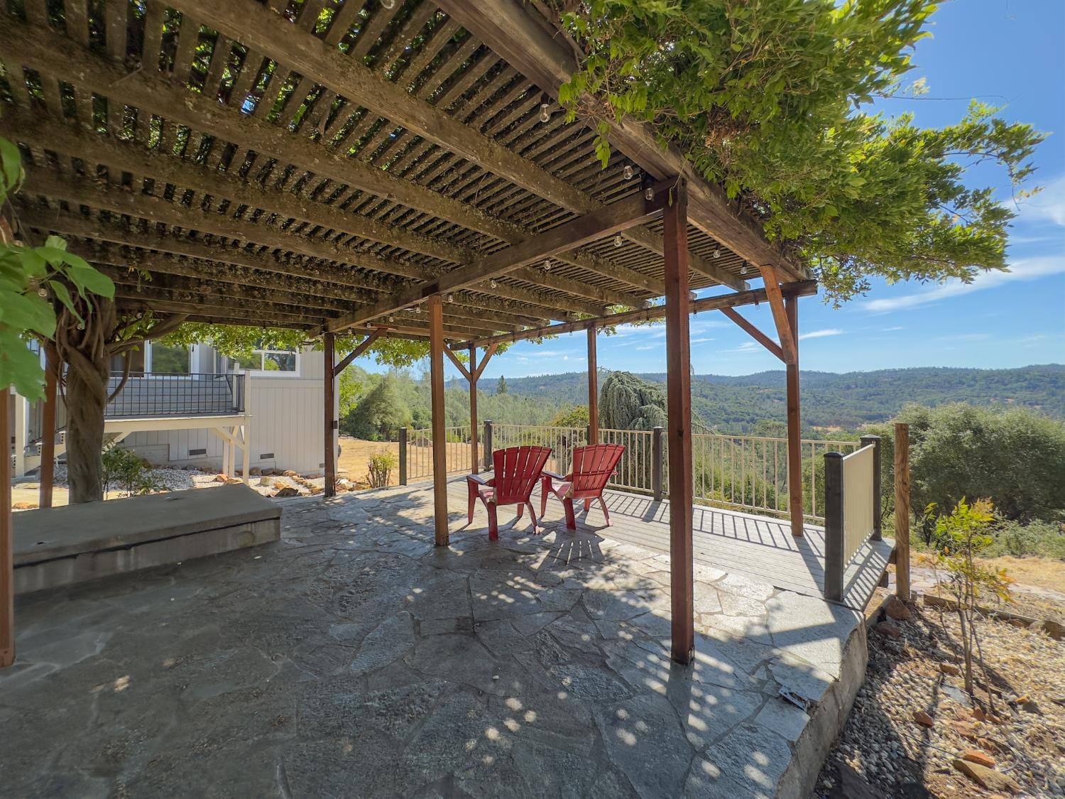 123 No Address Drive Rough and Ready, CA 95975 - Photo 80 of 95 a view of a porch with furniture and a yard
