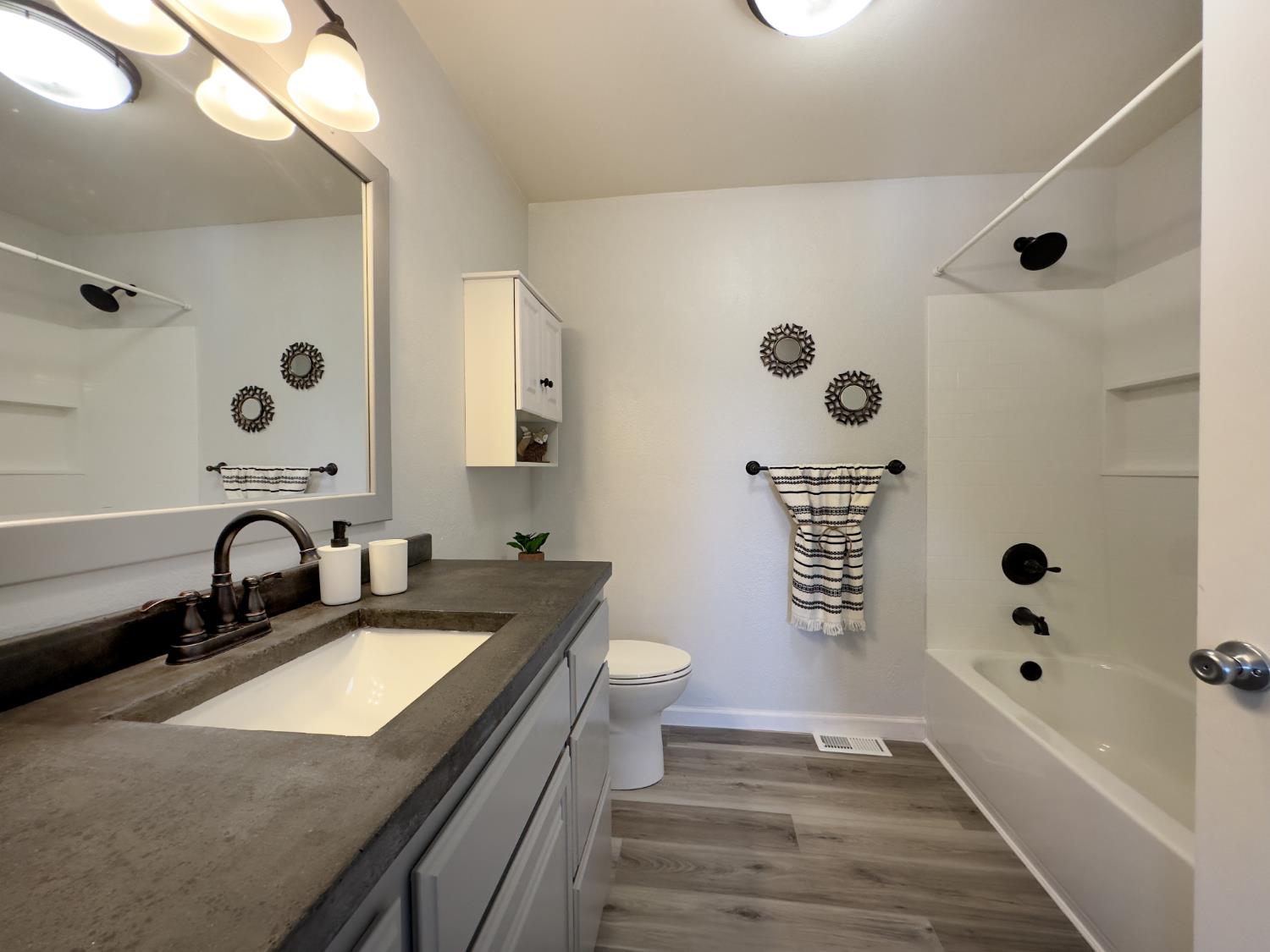 123 No Address Drive Rough and Ready, CA 95975 - Photo 90 of 95 a bathroom with a granite countertop sink and a bathtub