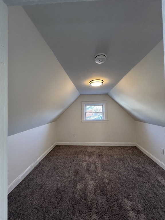 262 Nevada Street, Unit A Newton, MA 02460 - Photo 21 of 34 an empty room with a empty space and windows