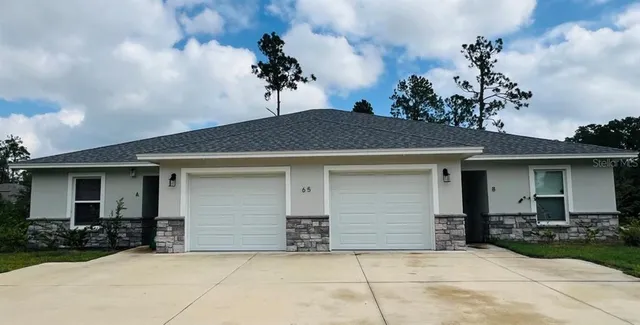 a house view with a outdoor space